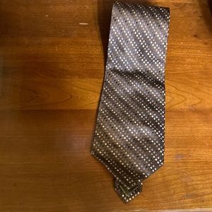 Calvin Klein. Brown with small diamonds